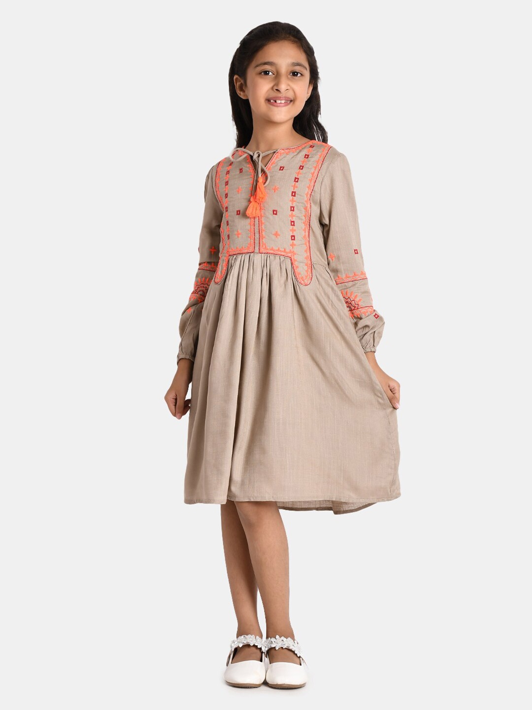 

Bella Moda Taupe & Orange Ethnic Motifs Embroidered Tie-Up Neck Fit and Flare Dress