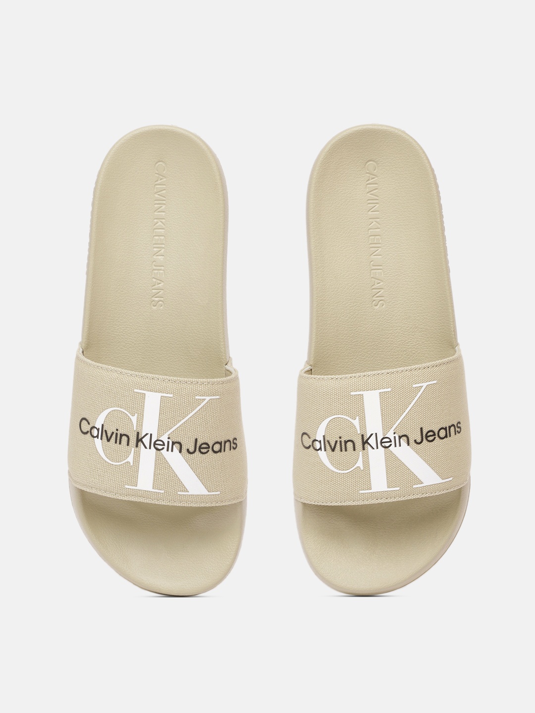 

Calvin Klein Men Cream-Coloured Printed Sliders