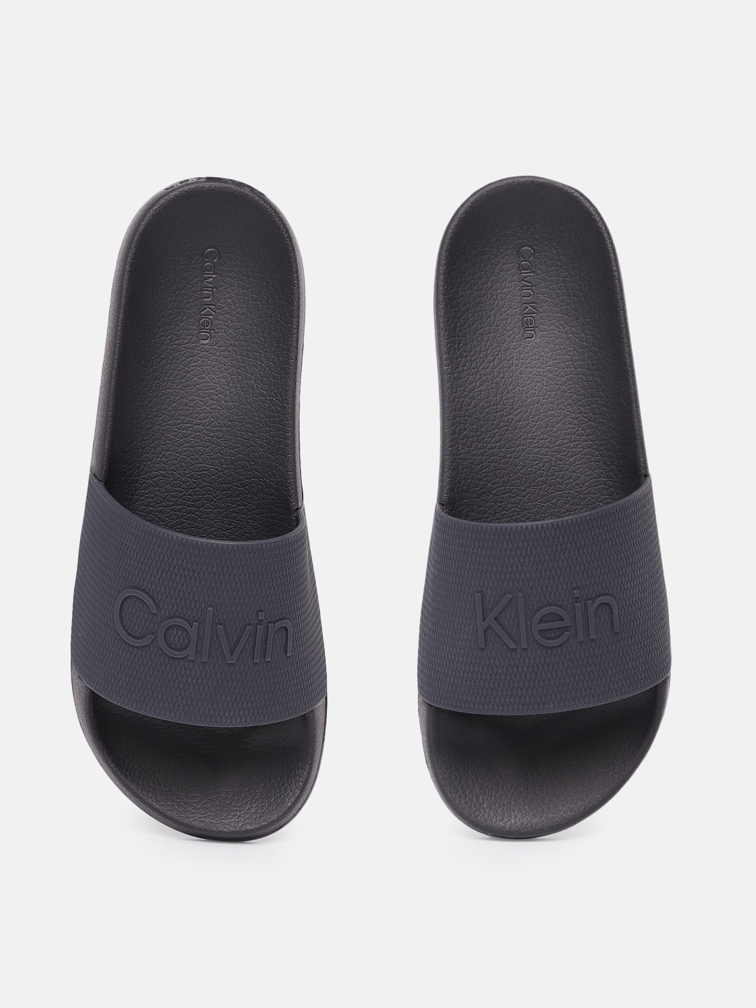 

Calvin Klein Men Navy Blue Rubber Sliders