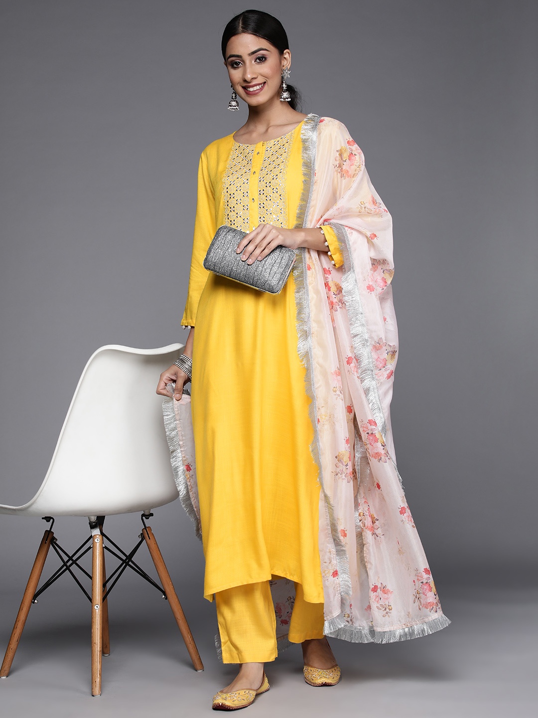 

Varanga Women Yellow Yoke Design Mirror Work Kurta with Trousers & Dupatta