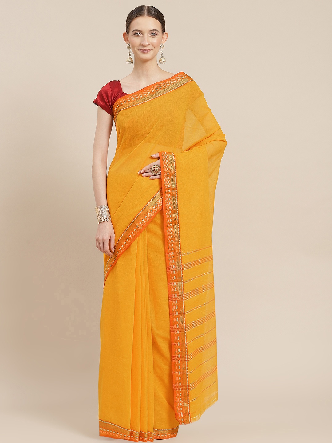 

Ishin Mustard Solid Zari Saree