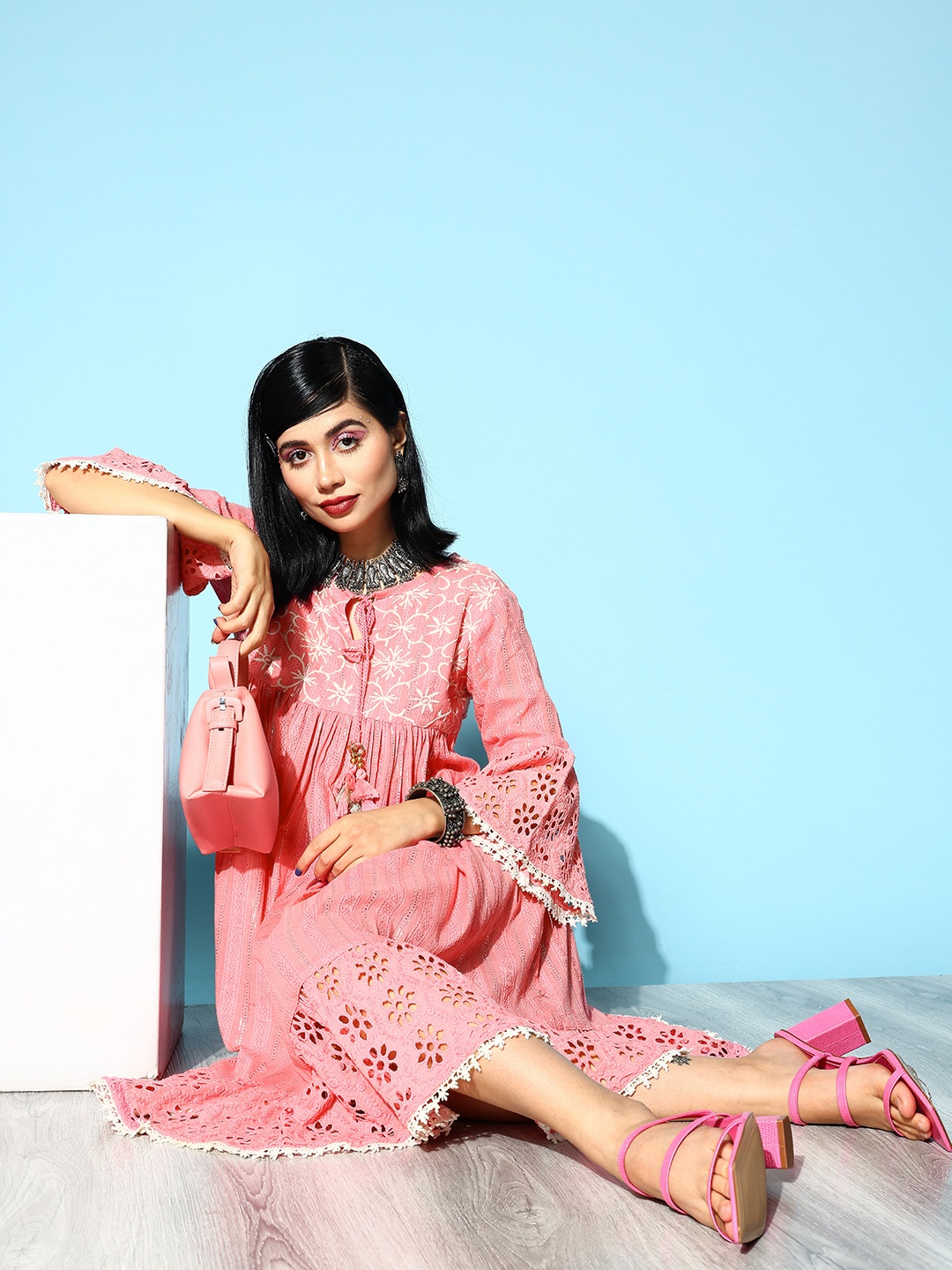 

Ishin Pink Ethnic Motifs Embroidered Schiffli Tie-Up Neck Ethnic A-Line Dress