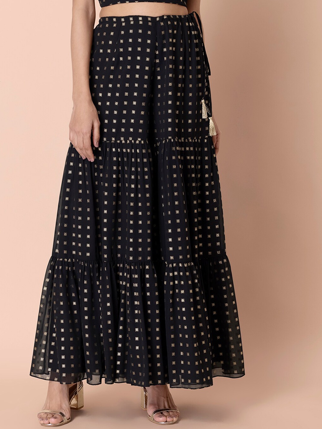 

INDYA Women Black & Gold-Toned Ethnic Motifs Printed Flared Ethnic Palazzos