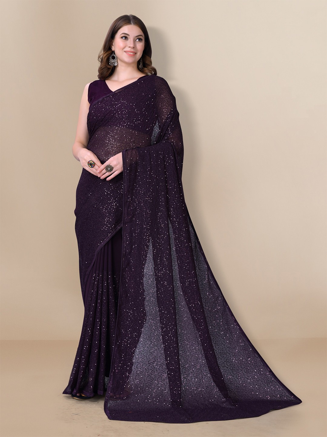 

VAIRAGEE Magenta Embellished Sequinned Georgette Saree