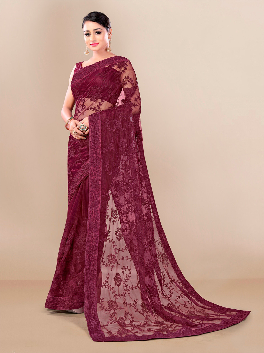 

VAIRAGEE Magenta Floral Embroidered Net Saree