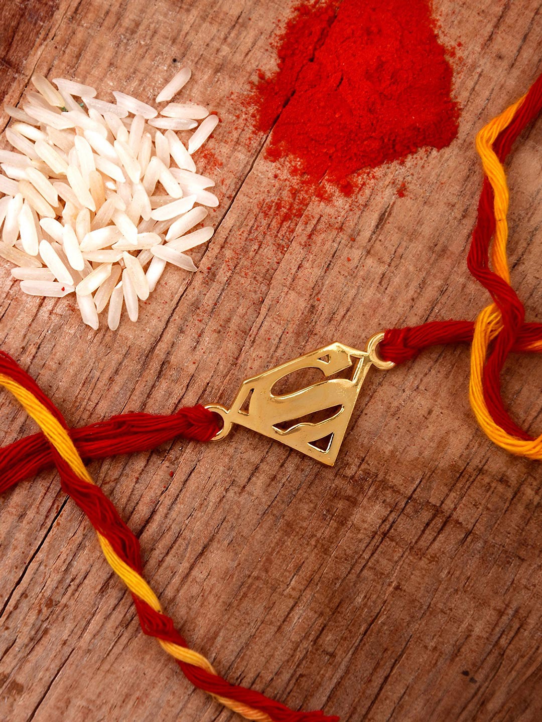 

Tistabene Red & Gold-Toned Super Man Rakhi