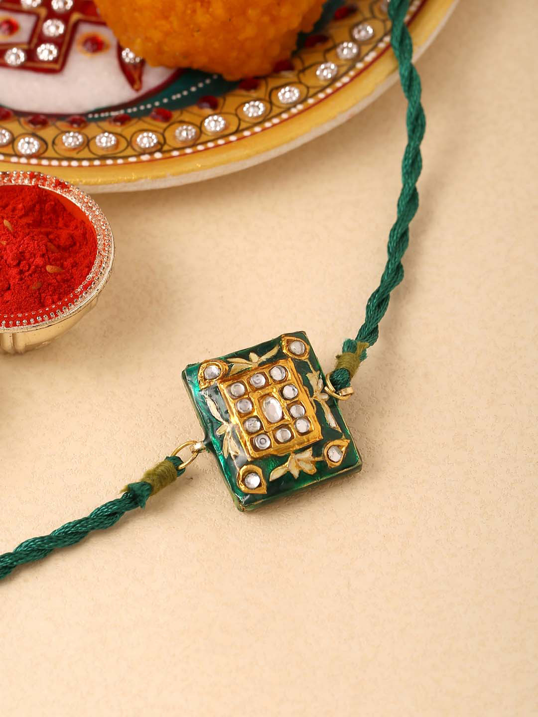 

Tistabene Men Green & Gold-Toned Stone-Studded Floral-Charm Rakhi