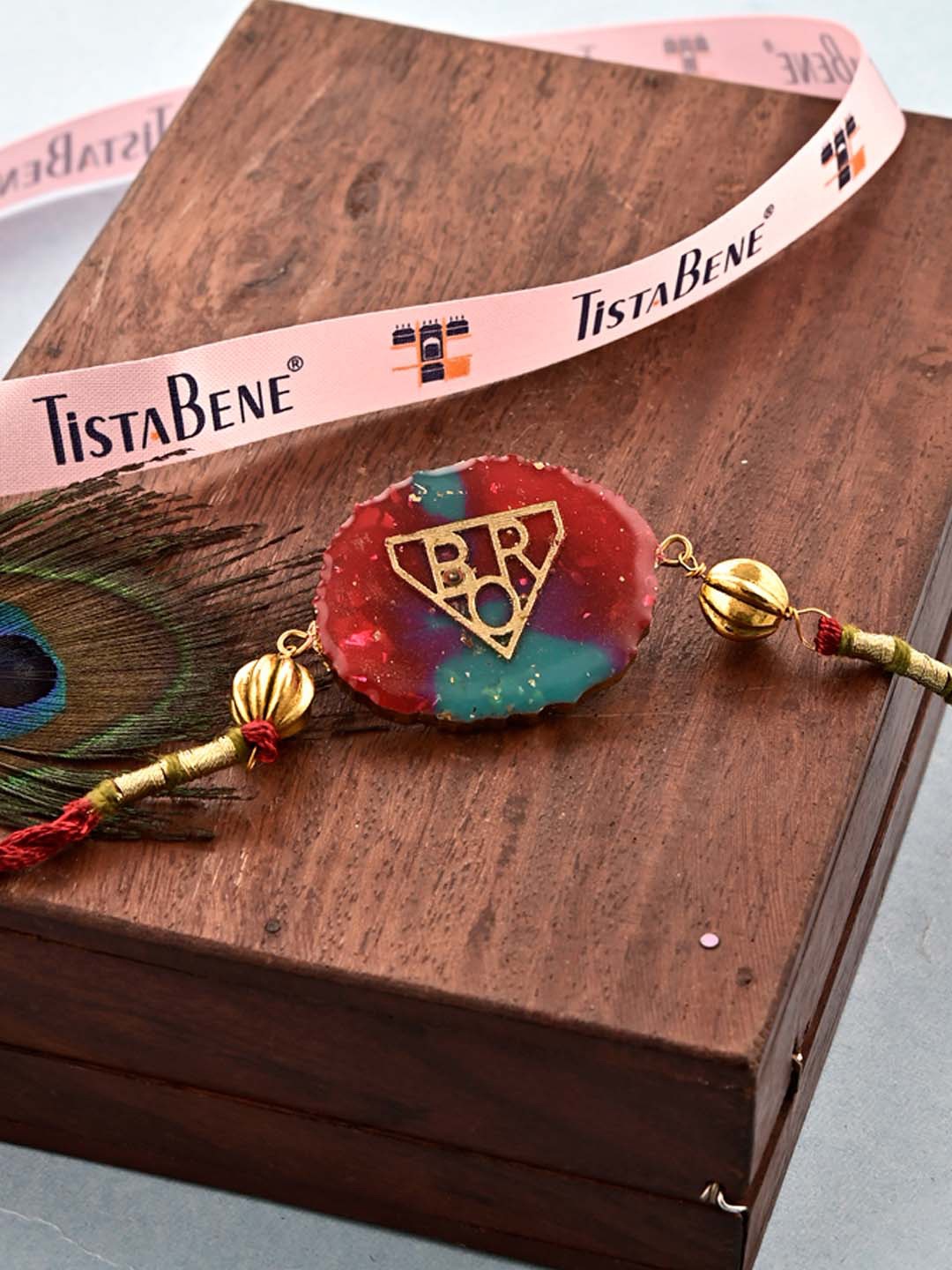 

Tistabene Men Gold-Toned & Red Bro Enamelled Rakhi
