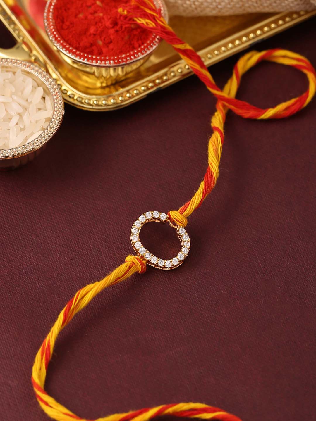 

Tistabene Men Red & Orange AD-Studded Alphabet Rakhi