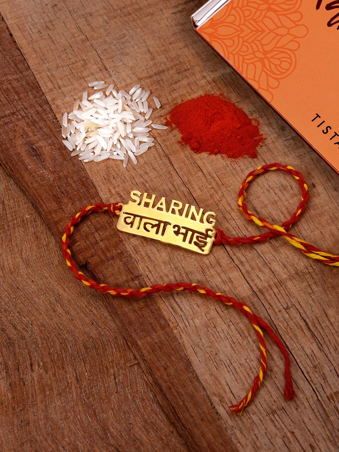 

Tistabene Men Gold-Toned & Red Sharing Vala Bhai-Charm Rakhi