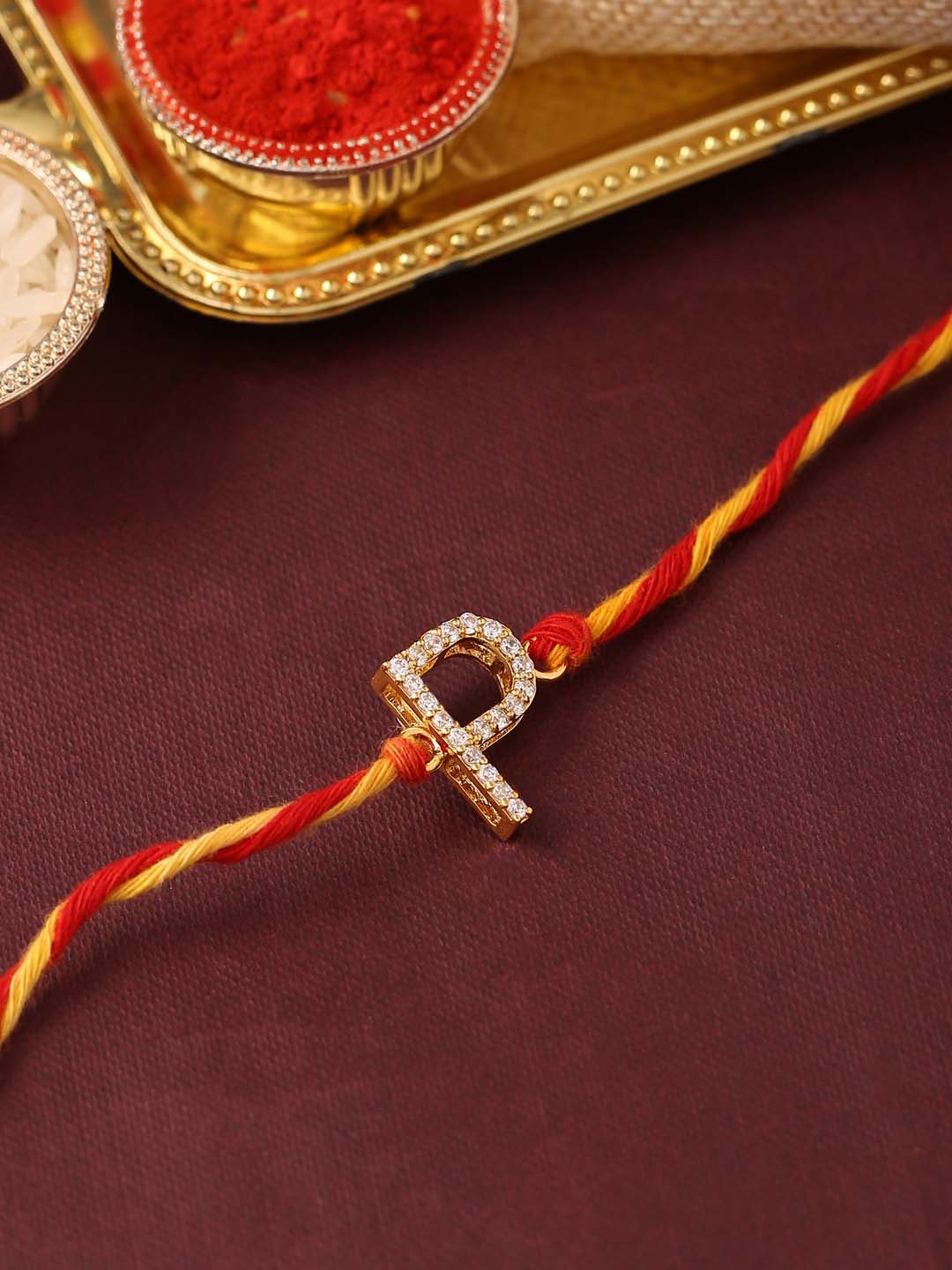 

Tistabene Men Gold-Toned & White AD-Studded Rakhi