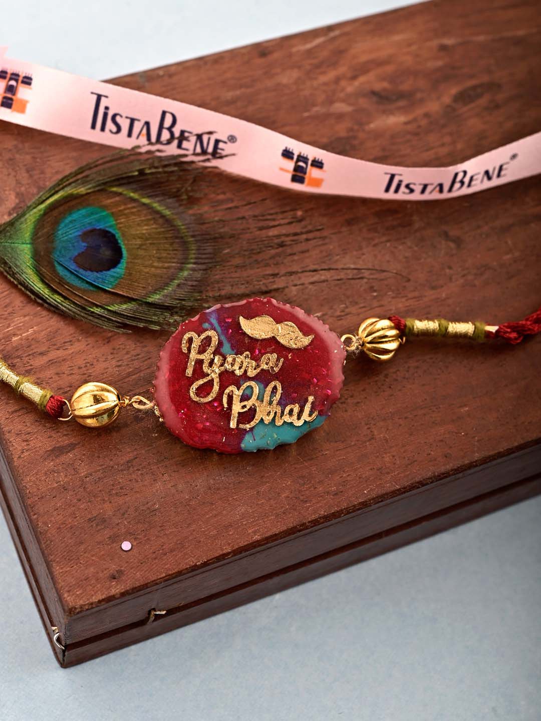 

Tistabene Men Red & Pink Enamelled Charm Rakhi