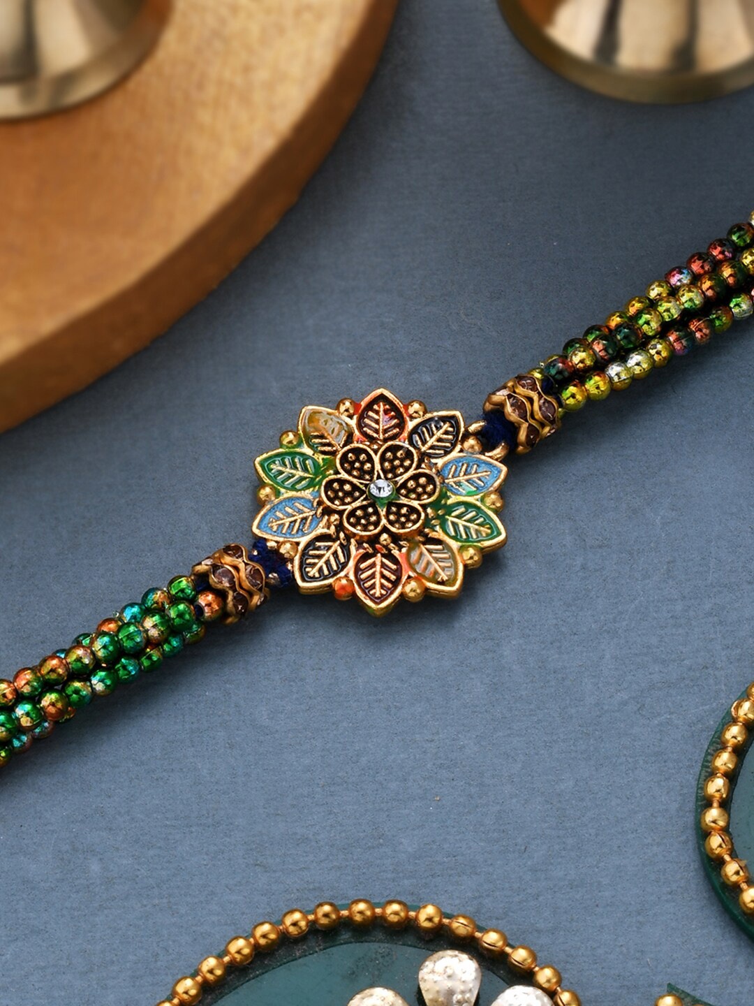 

Dare by Voylla Men Gold-Toned & Green Leafy Design Beaded Rakhi