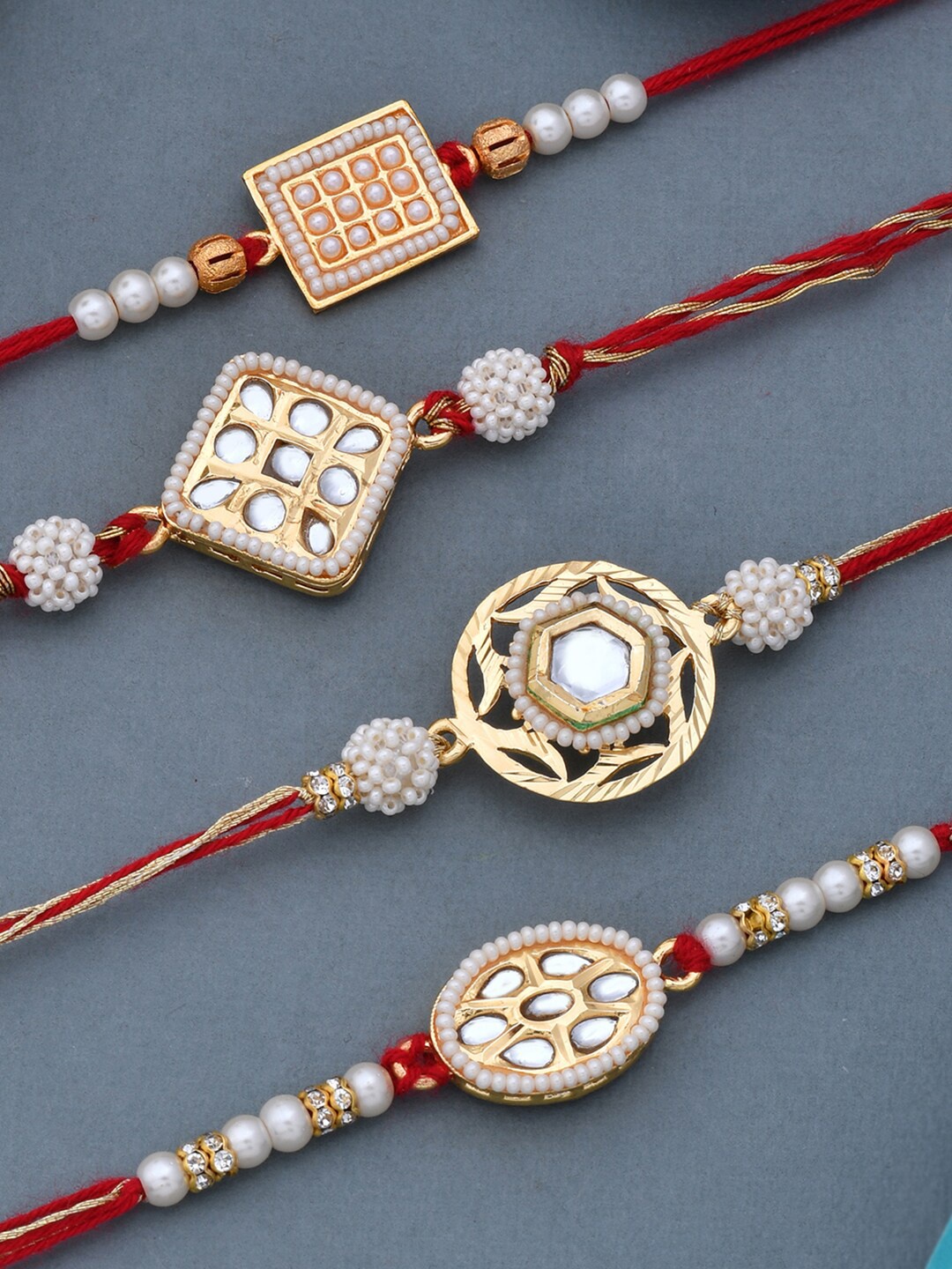

Dare by Voylla Men Set Of 4 Red & Gold-Toned Meenakari Work & Kundan Studded Rakhi