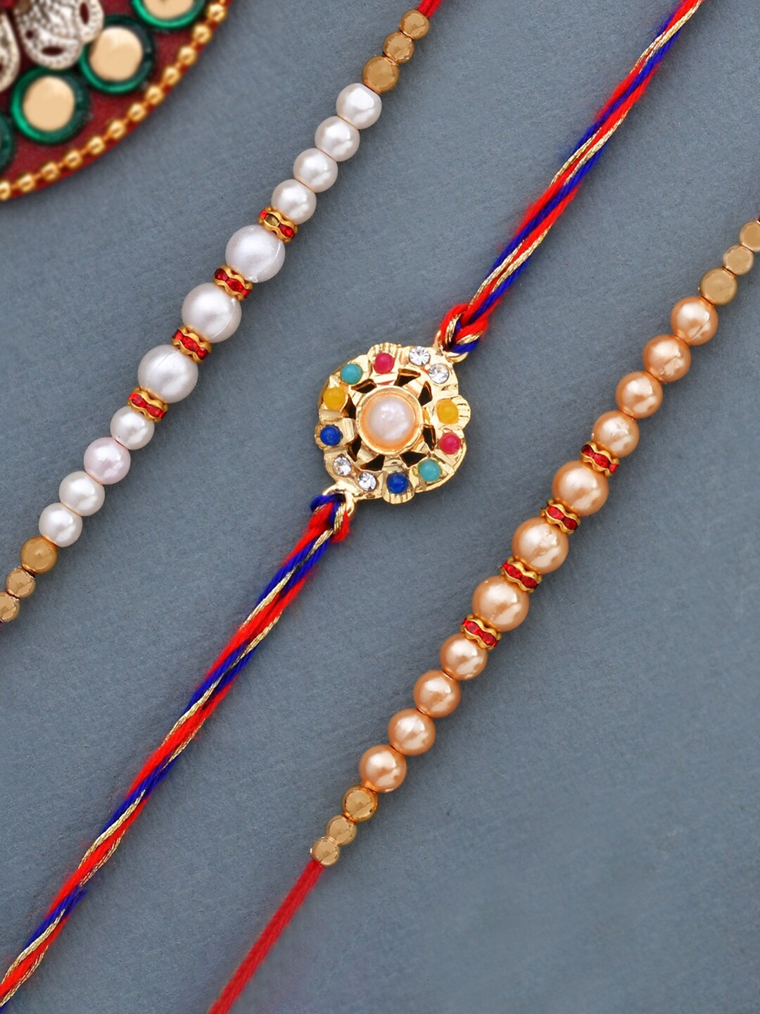 

Dare by Voylla Set of 3 Pearl Beads Studded Thread Rakhi, Red