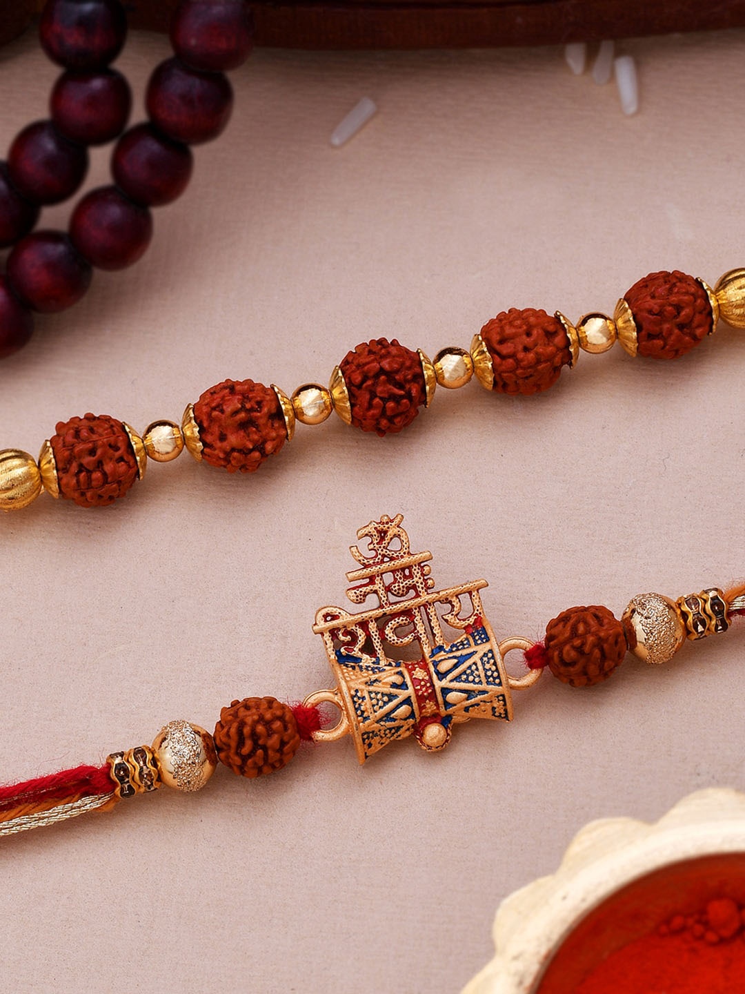 

Dare by Voylla Men Pack Of 2 Rudraksh Embellished Red Threaded Rakhi