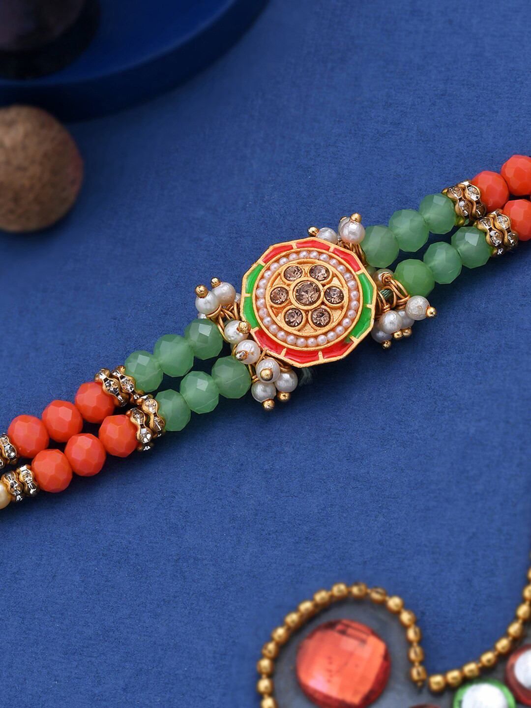

Dare by Voylla Men Red & Green Beaded Pendant Rakhi