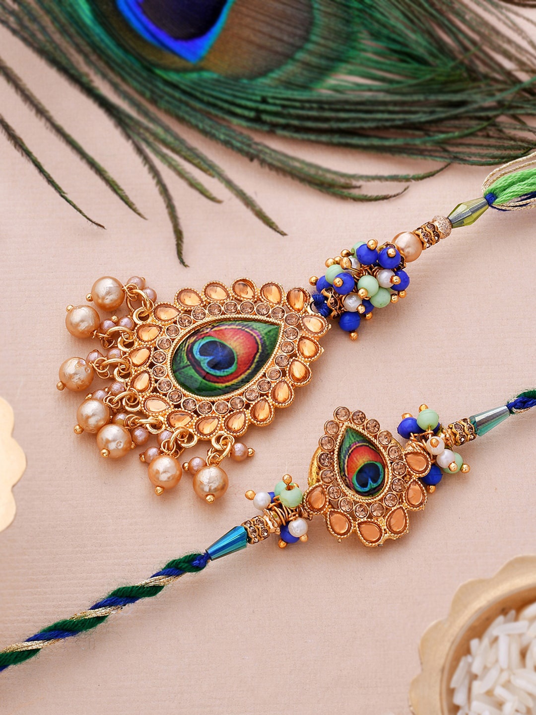 

Voylla Pack Of 2 Blue Stone Studded Peacock Themed Rakhi