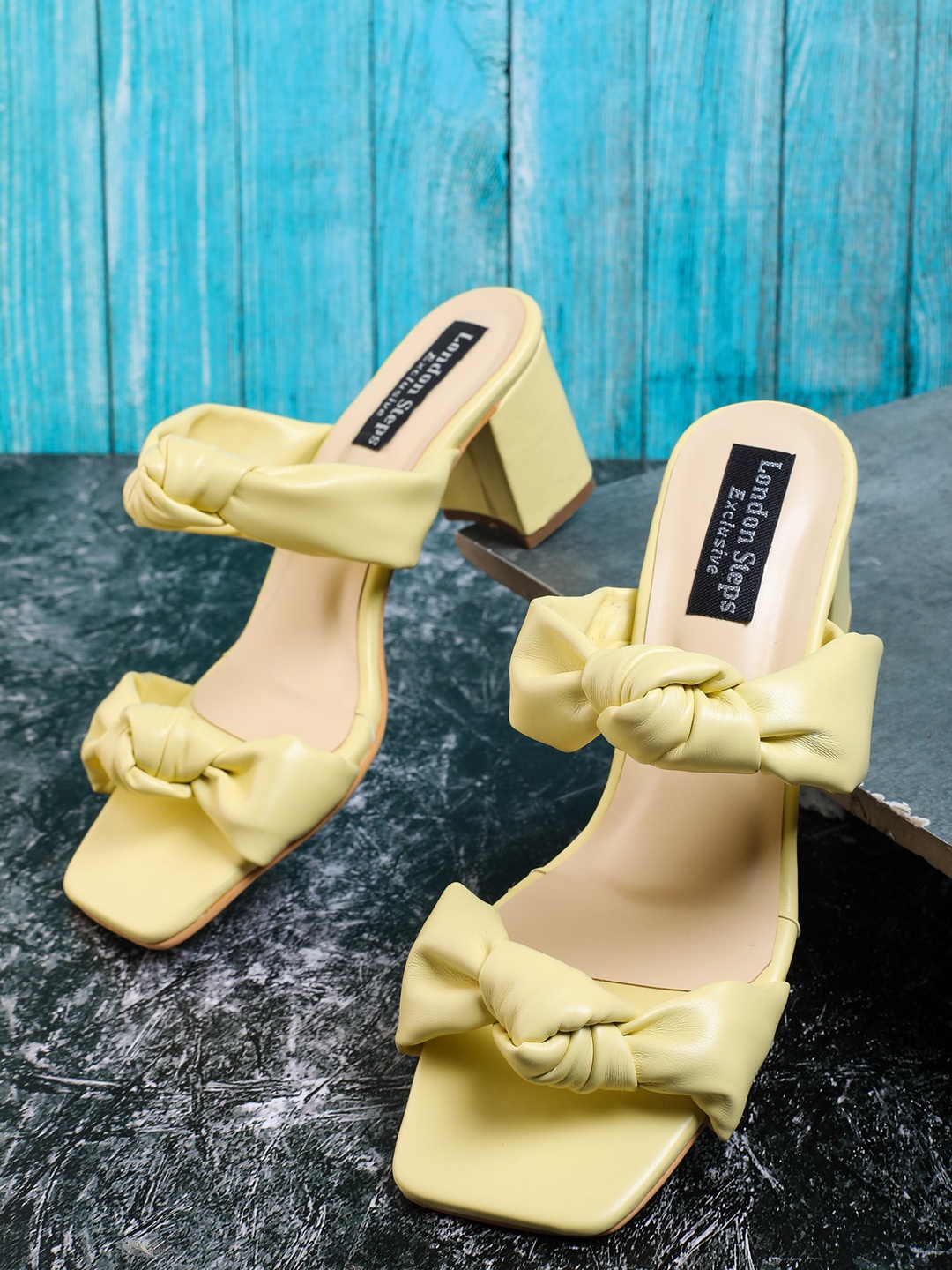 

LONDON STEPS Yellow Solid Block Pumps with Bows