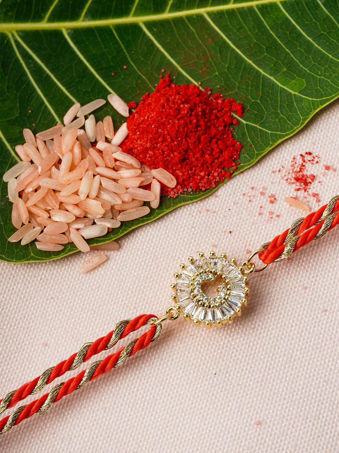 

Ferosh Gold-Toned & Red C Alphabet Rhinestone Rakhi