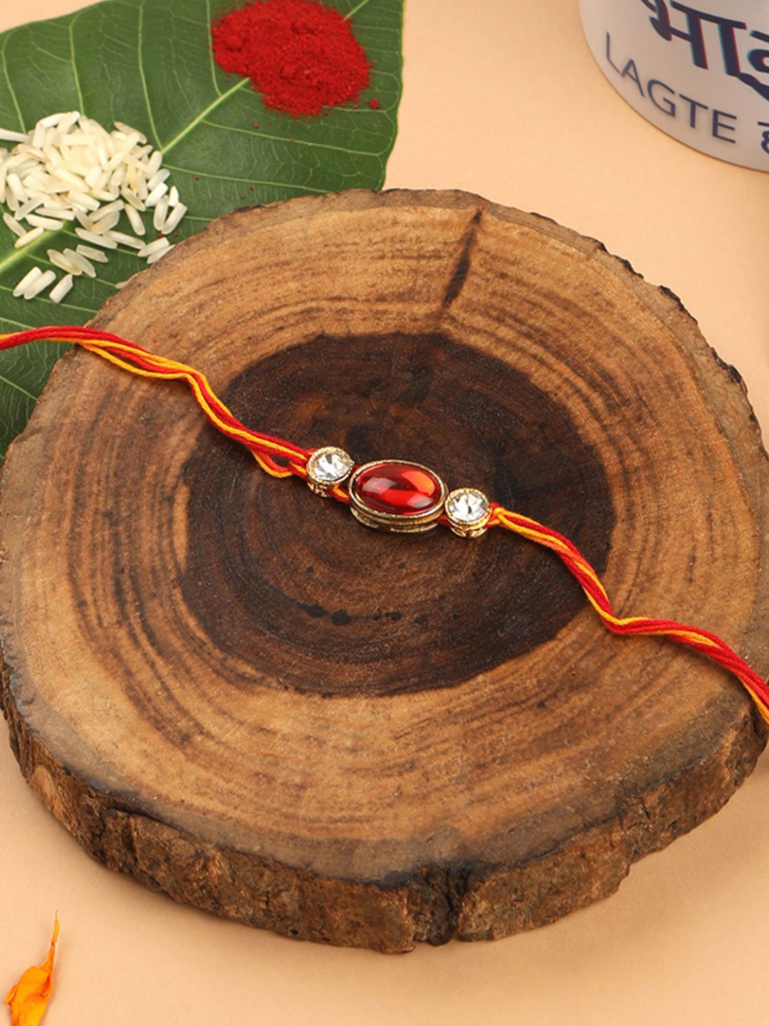 

Accessher Ruby & Rhinestones Embellished Rakhi with Greeting Card for Brother & Gifting, Red