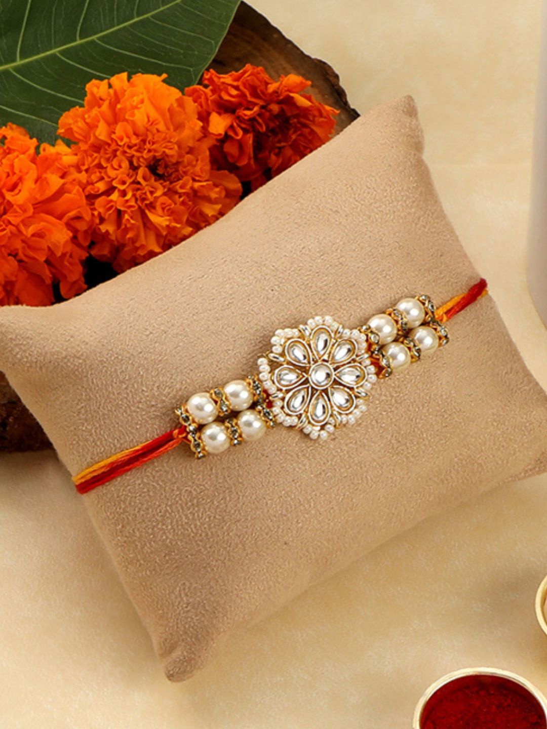 

AccessHer White & Red Kundan Studded Rakhi Set