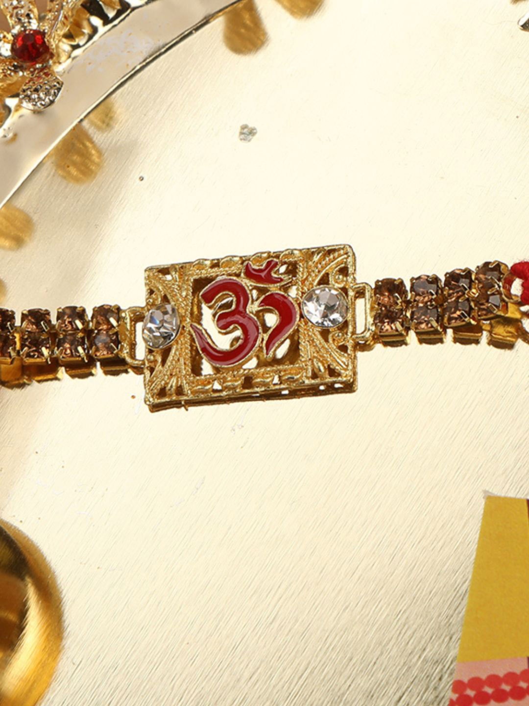 

AccessHer Red & Gold-Toned Om Stone-Studded Thread Rakhi