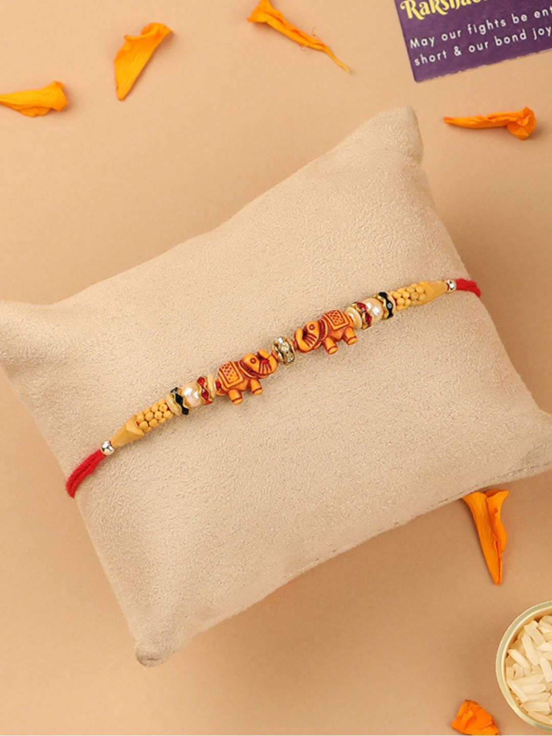 

Accessher Red & Gold-Toned Elephant Design Beaded Rakhi with Greeting Card Set