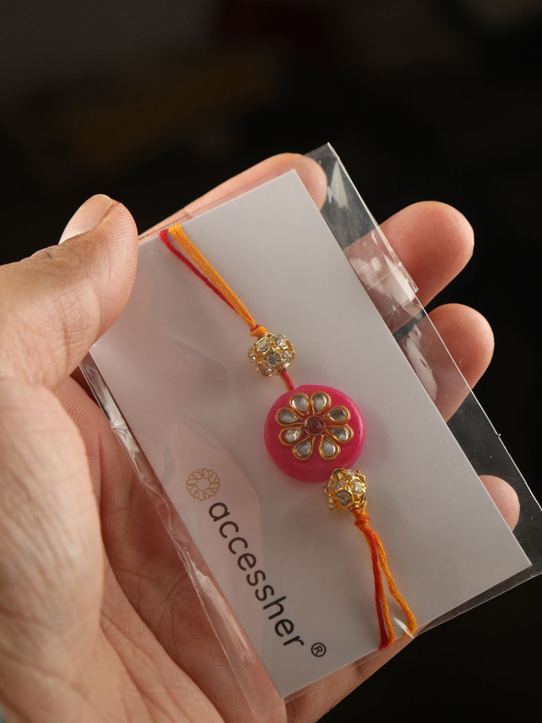 

Accessher Pink & Orange Enamel Rakhi with Greeting Card Set