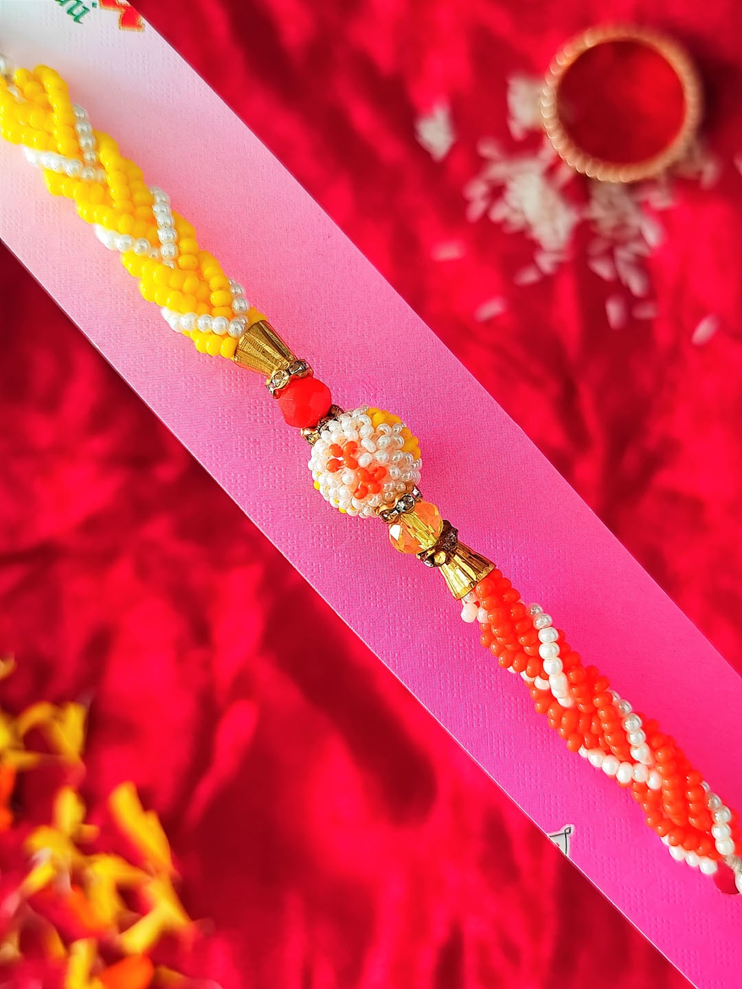 

CRAYTON Multicolored Small Pearl Rakhi, Yellow