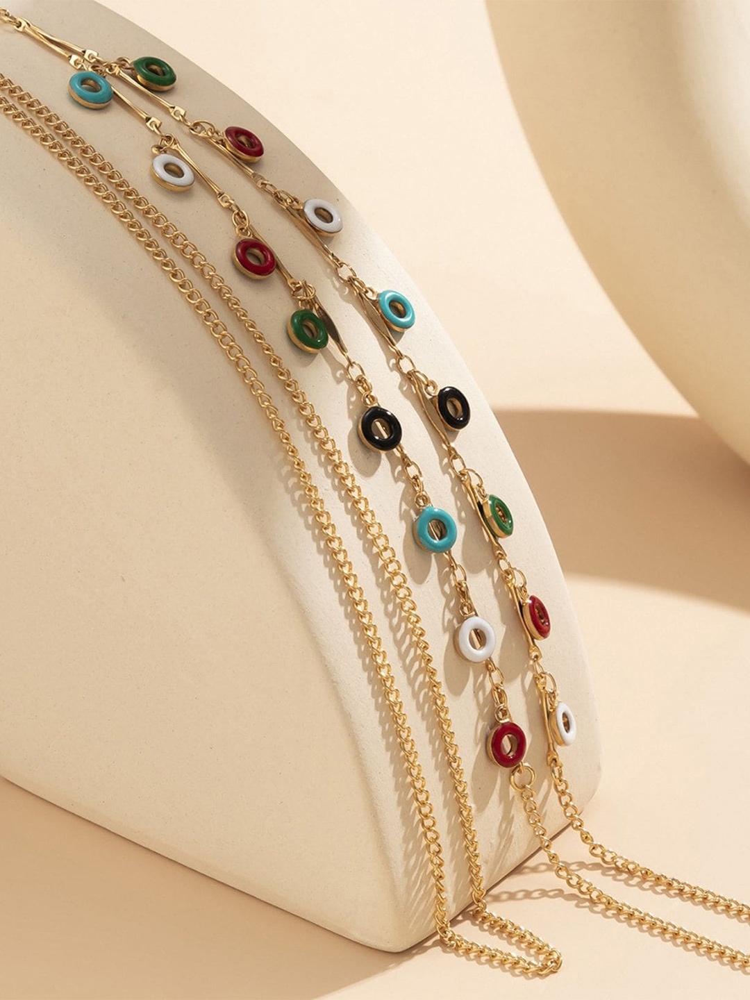 

FemNmas Women Gold-Toned & Black Tasselled Colourful Leg Chain