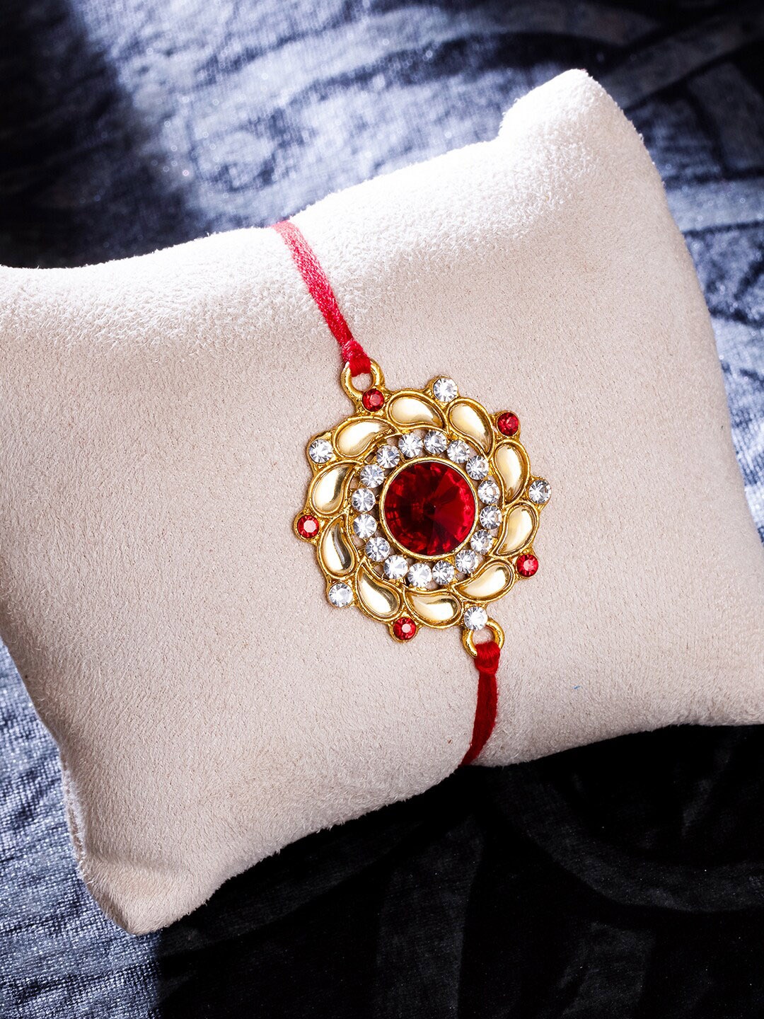 

Sukkhi Rakhi Men Gold-Plated & Red Beaded Thread Rakhi