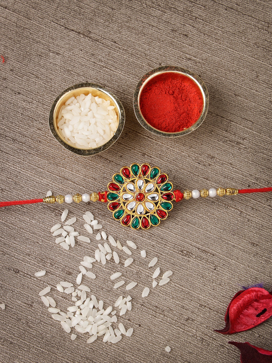 

Sukkhi Rakhi Men Red & Green Gold-Plated Floral Rakhi with Roli Chawal and Rakhi Greeting Card