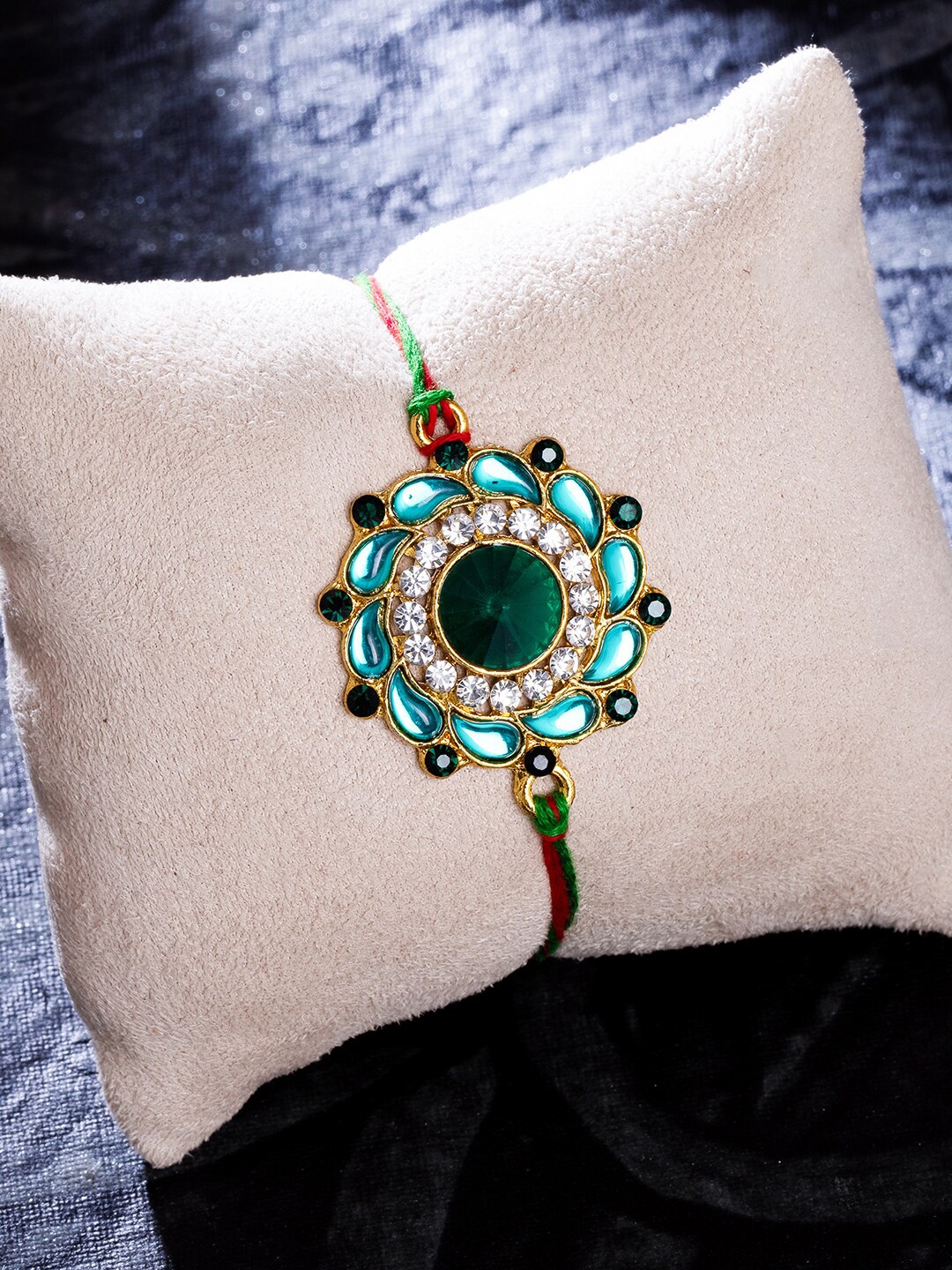 

Sukkhi Rakhi Blue Gold-Plated Floral Rakhi