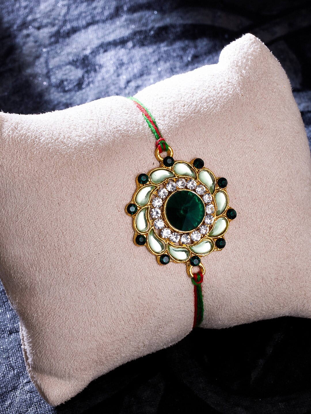 

Sukkhi Rakhi Gold-Plated Green Floral Kundan Studded Rakhi with Roli Chawal and Greeting Card