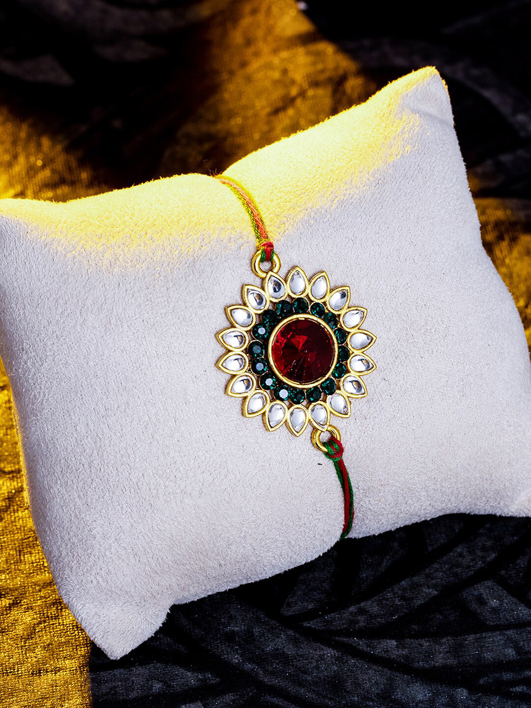 

Sukkhi Rakhi Men Gold-Plated Red Thread Rakhi