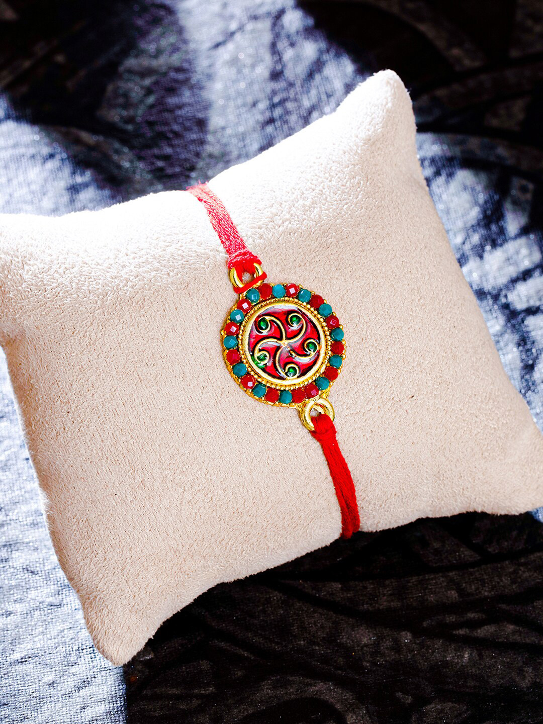 

Sukkhi Rakhi Red Gold-Plated Floral Meenakari Rakhi with Roli Chawal and Greeting Card