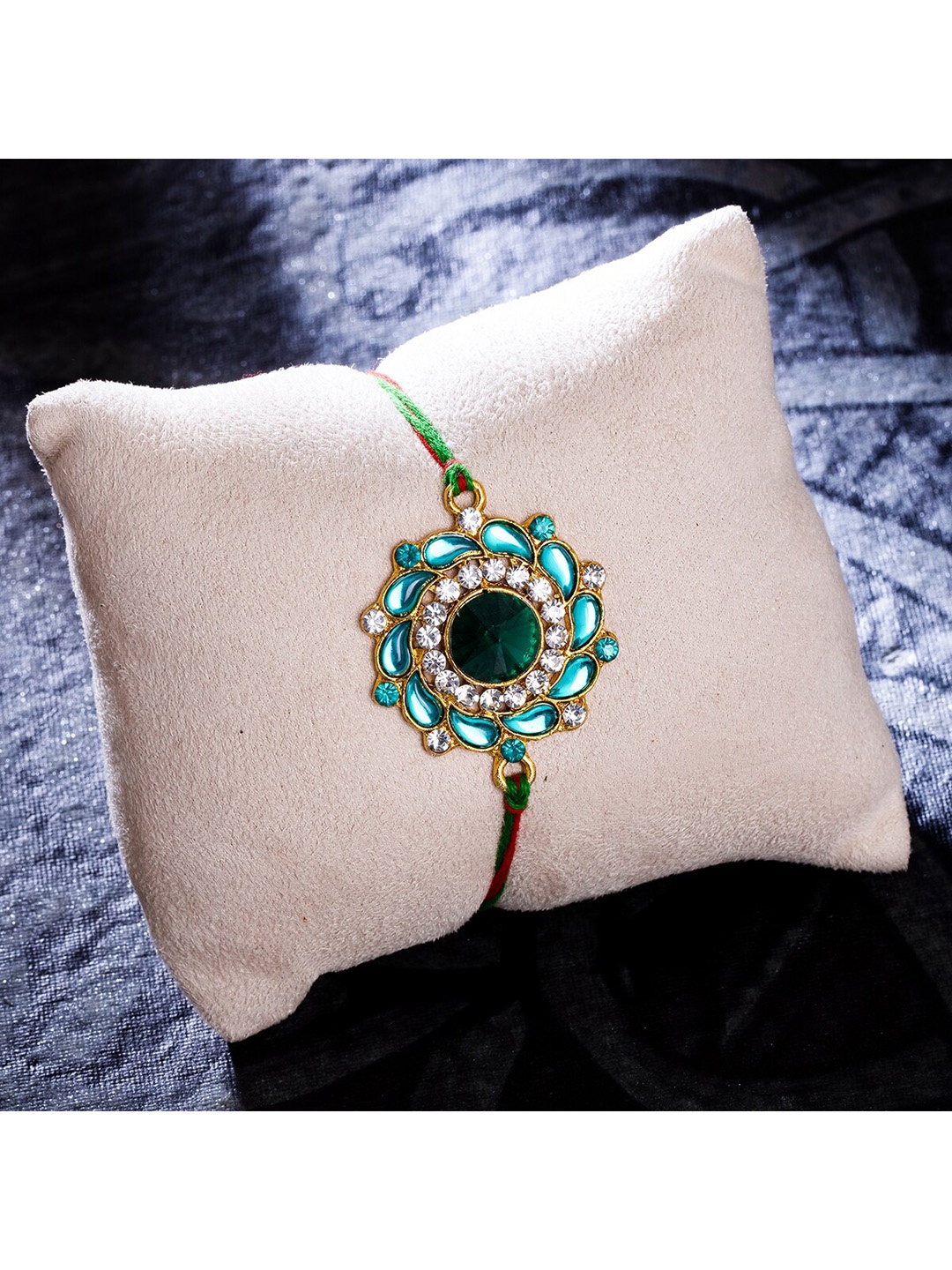 

Sukkhi Rakhi Gold-Plated Blue & White Floral Rakhi with Roli Chawal & Greeting Card