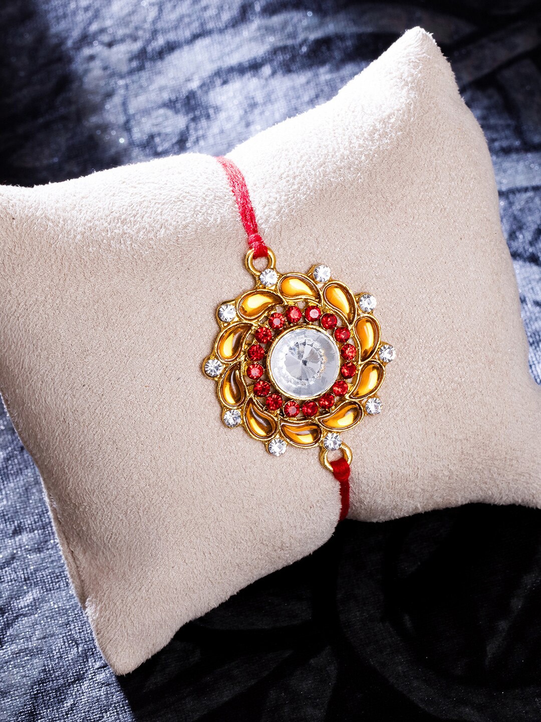 

Sukkhi Rakhi Yellow Gold-Plated Floral Rakhi Combo