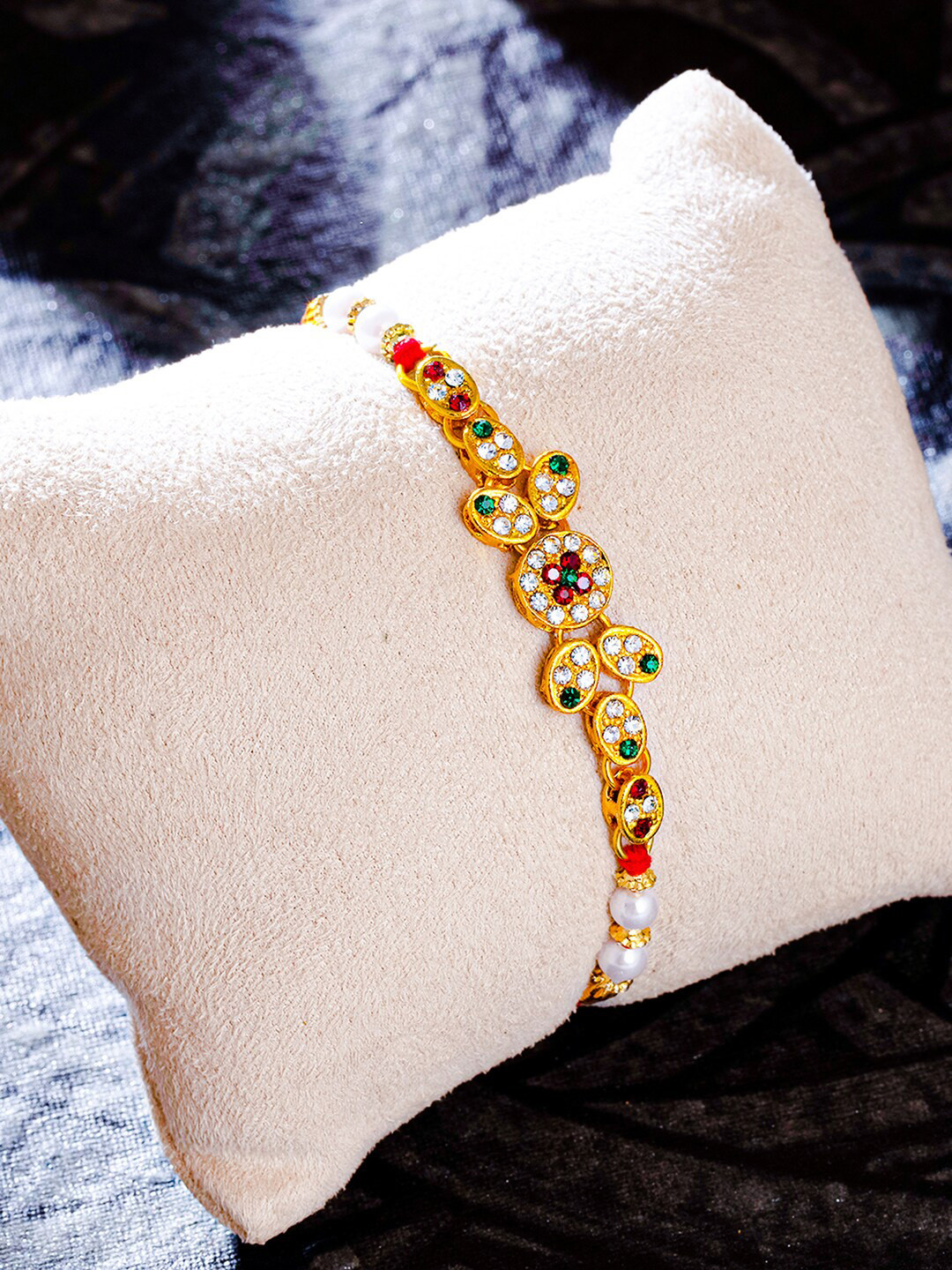 

Sukkhi Rakhi Red & Green Gold-Plated Rakhi