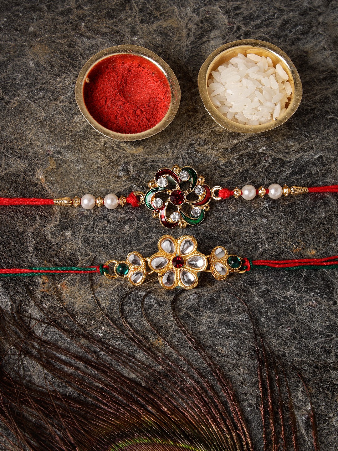 

Sukkhi Rakhi Men Gold-Plated & Red Kundan Studded Meenakari Rakhi Set of 2