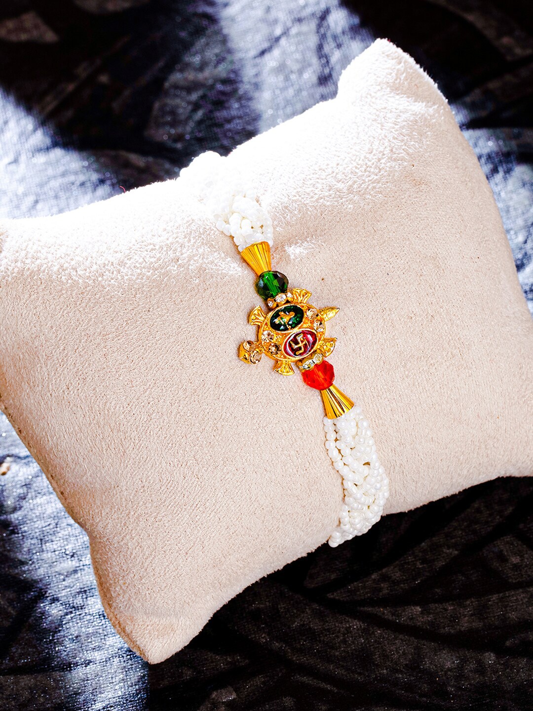 

Sukkhi Rakhi Gold-Plated Turtle Rakhi with Roli Chawal & Greeting Card