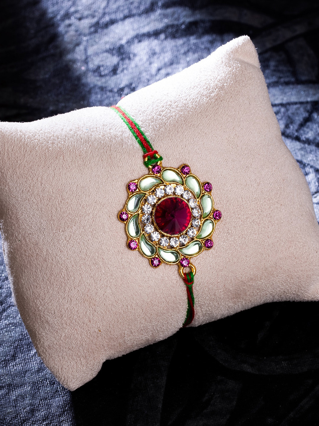 

Sukkhi Rakhi Men Gold-Plated Floral Pink Kundan Rakhi with Roli Chawal & Greeting Card