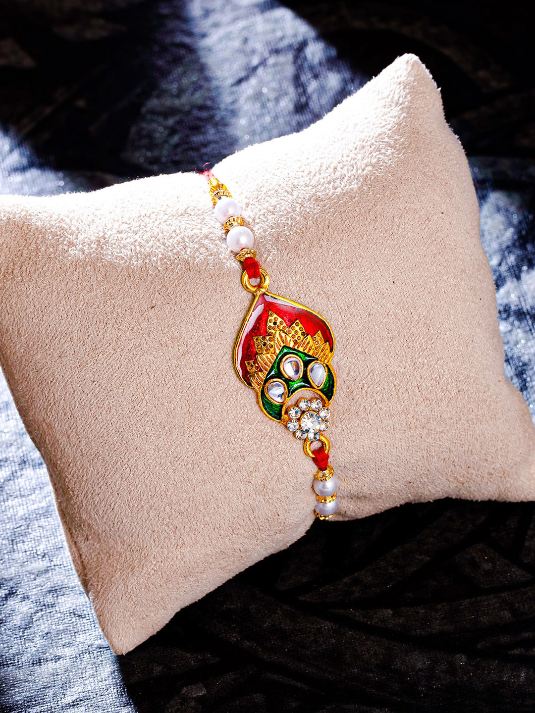 

Sukkhi Rakhi Gold-Plated Kundan Meenakari Rakhi with Roli Chawal and Rakhi Greeting Card