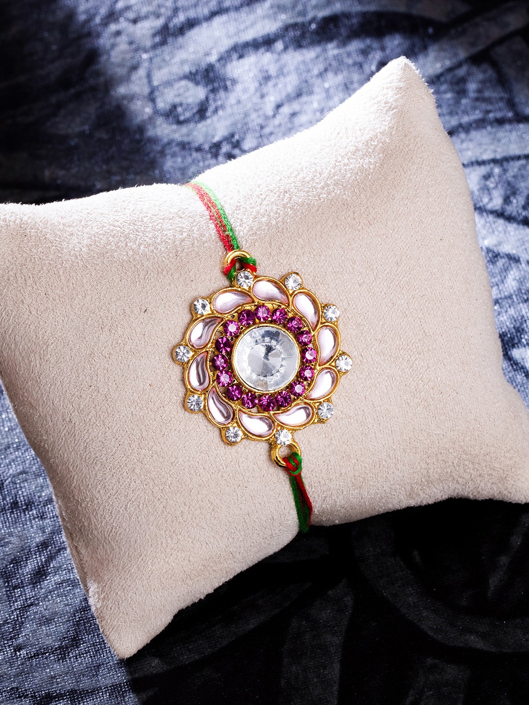 

Sukkhi Rakhi Men Gold-Plated & Purple Rakhi With Roli Chawal & Greeting Card