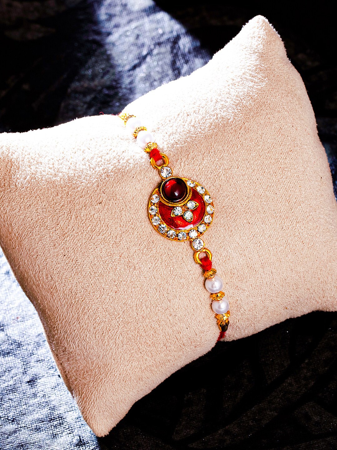 

Sukkhi Rakhi Red & Gold-Plated Meenakari Rakhi