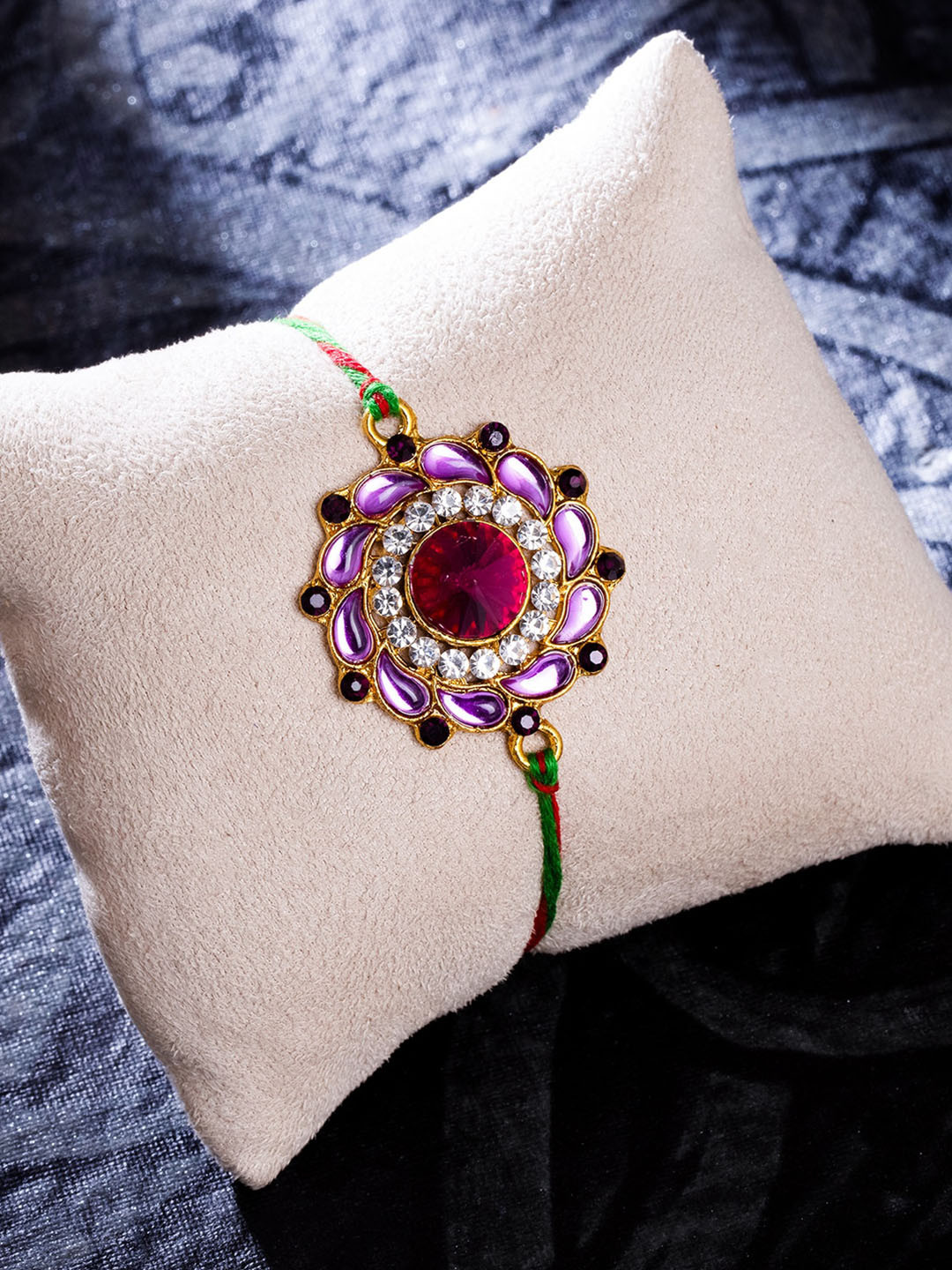 

Sukkhi Rakhi Purple & Gold-Plated Floral Rakhi
