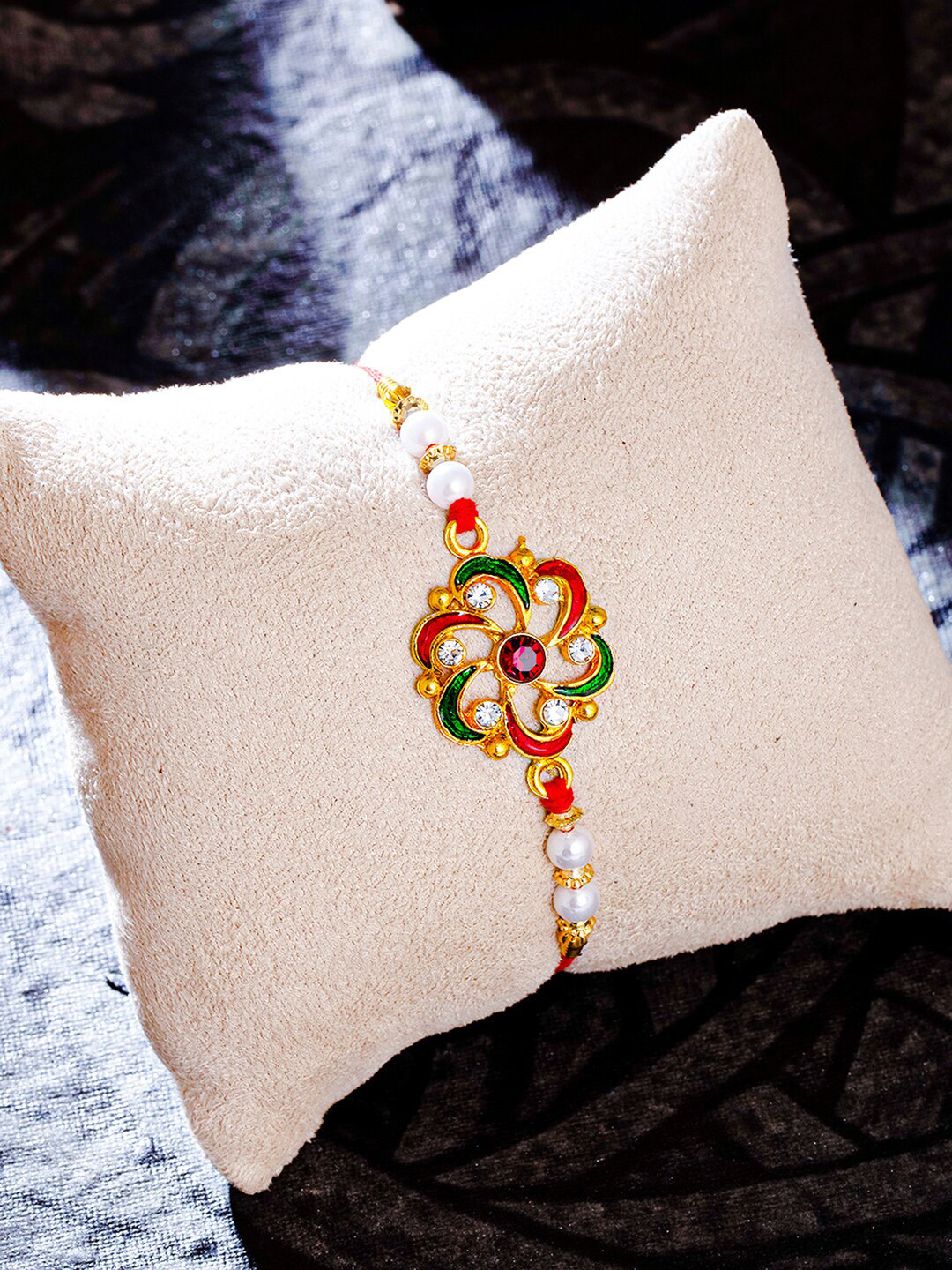 

Sukkhi Rakhi Gold-Plated Floral Meenakari Rakhi with Roli Chawal & Greeting Card