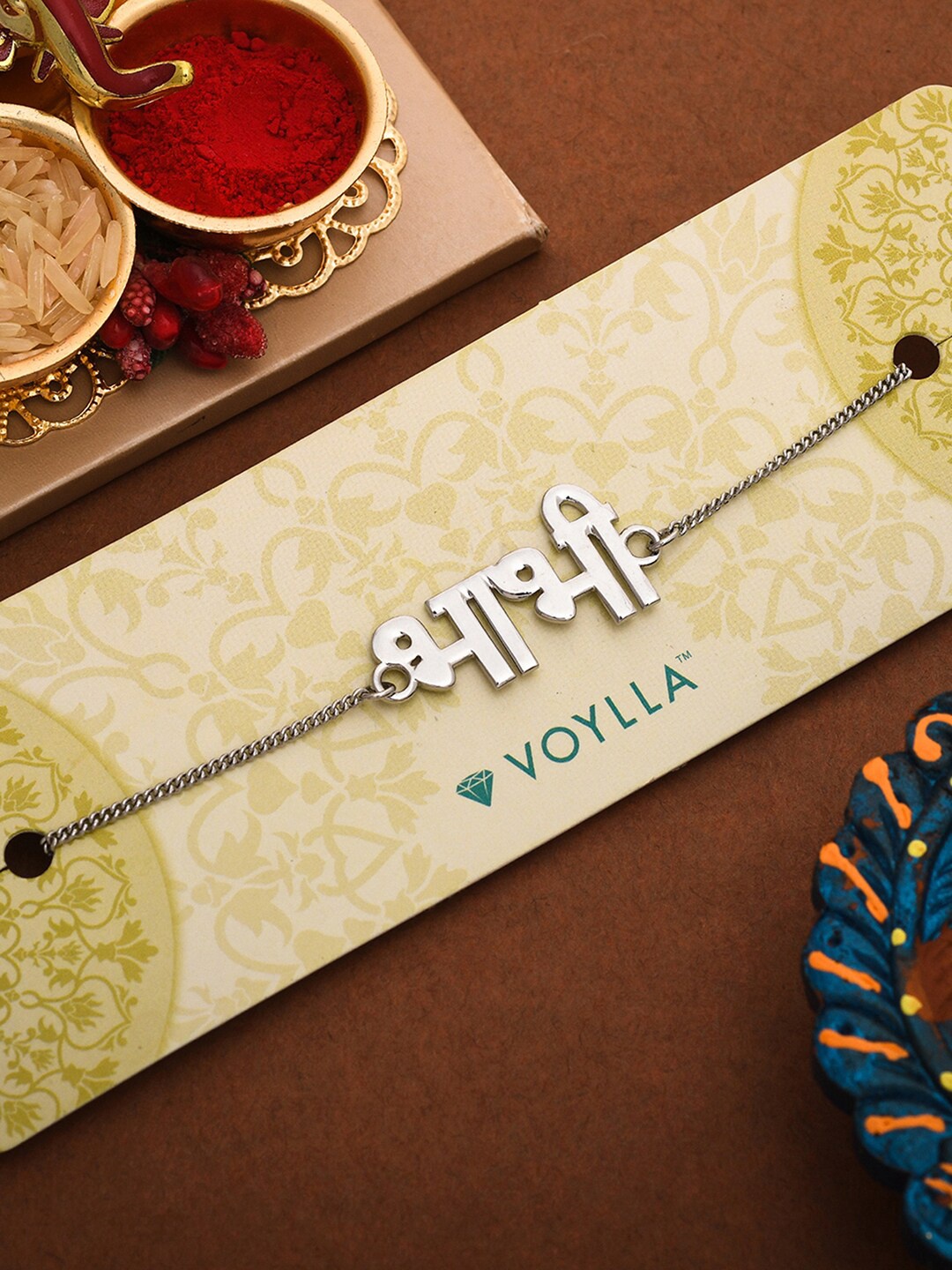 

Voylla Silver-Toned Bracelet Style Bhabhi Rakhi