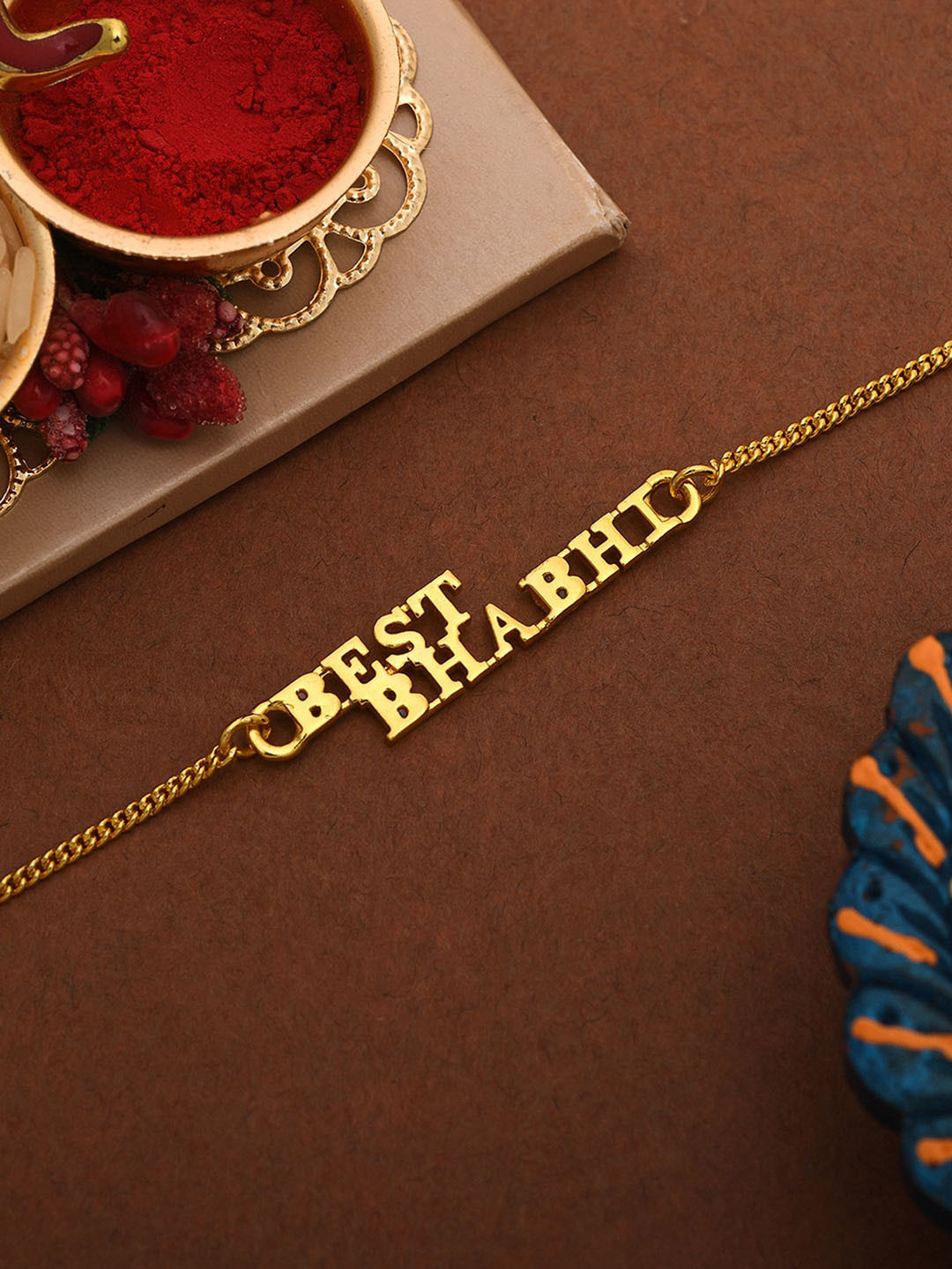 

Voylla Best Bhabhi Rakhi in Gold Tone
